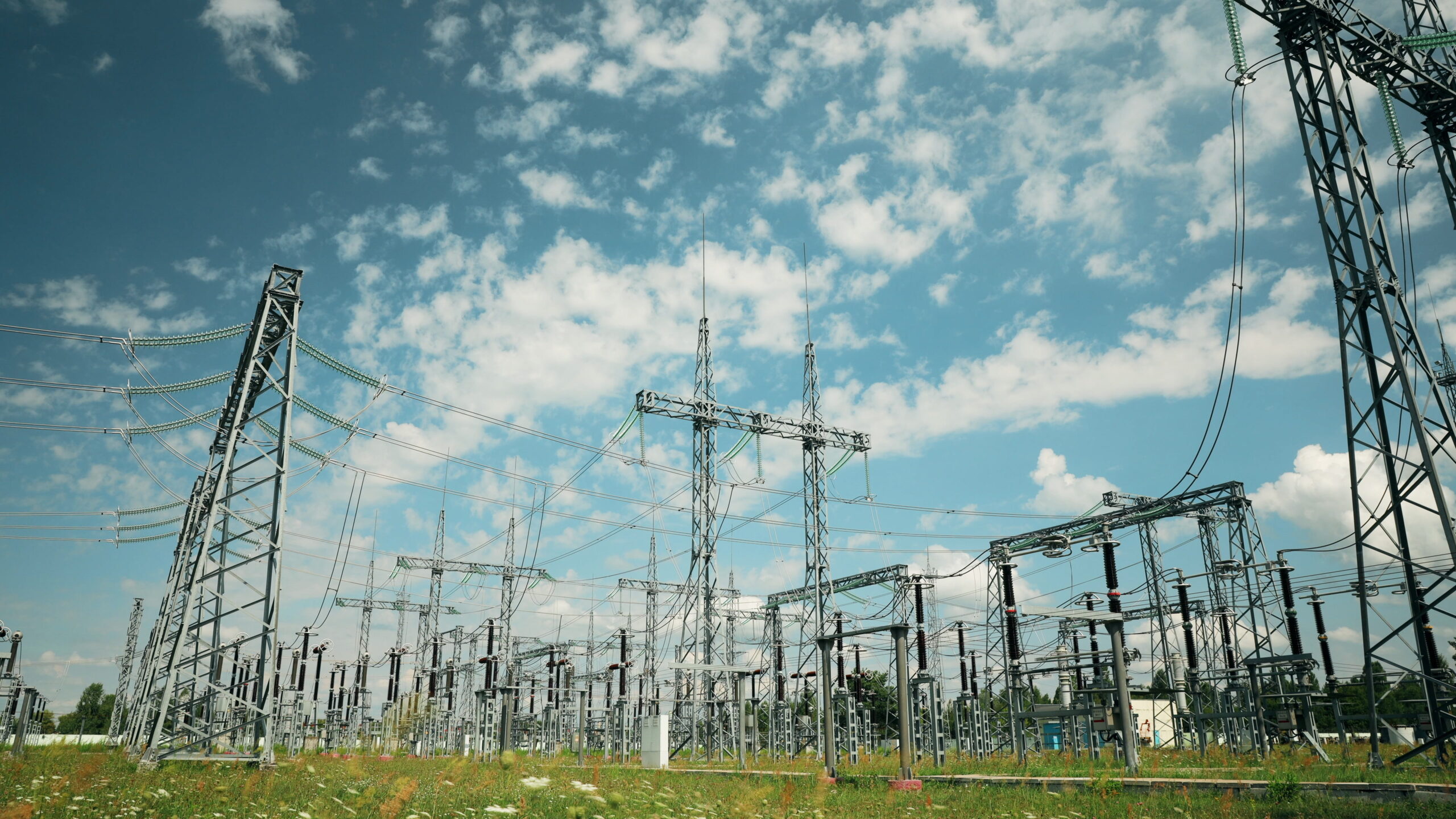 Power Grid Station. Electrical Distribution Station, Transformers, High-voltage Lines In Sunny Summer Day. ,